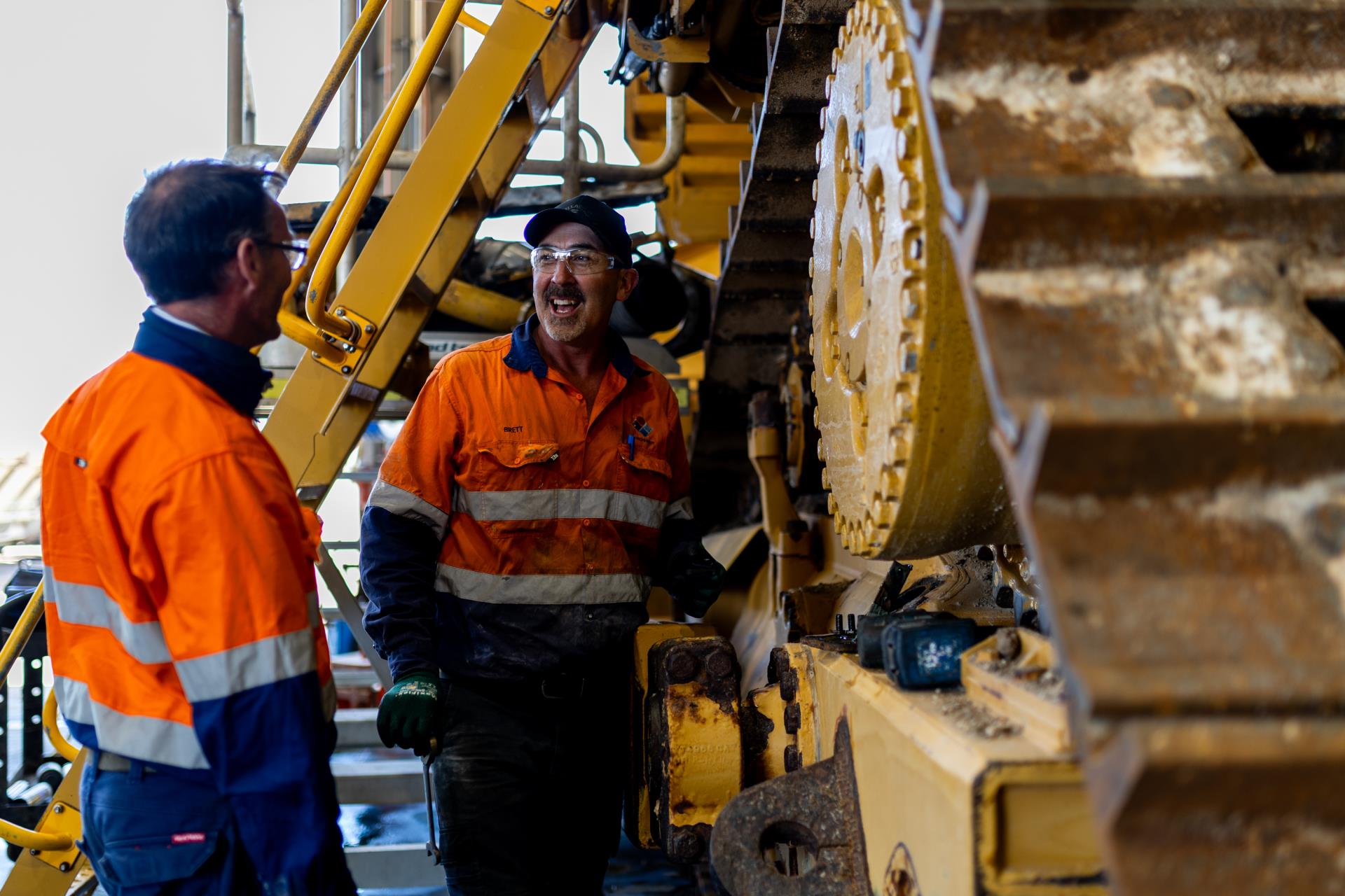 Leic team in office with map